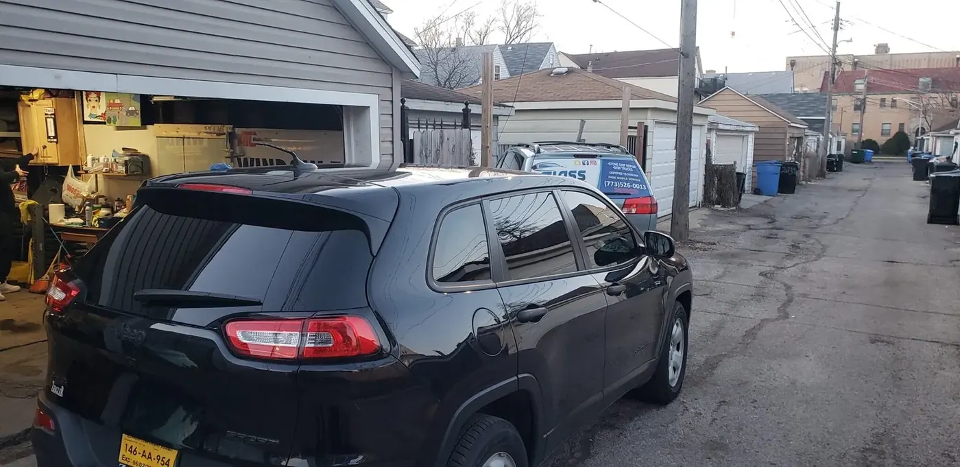SUV rear glass service in progress